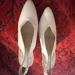 Vince Camuto sling back heels size 7 1/2. Worn once.